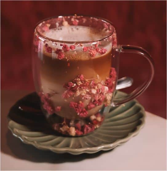 Herbal tea with rose petals, cozy and fragrant.