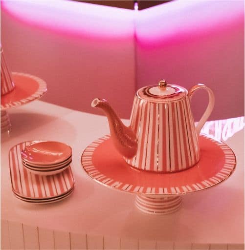 Chic pink and white striped teapot with matching cups.